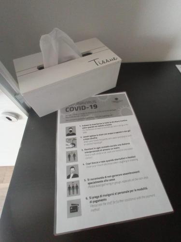 a box with a piece of paper on a table at La Tana del Ghiro Locazione Turistica in Sedico