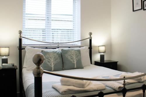 מיטה או מיטות בחדר ב-Abingdon - Private Flat with Garden & Parking 02