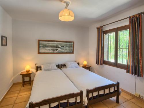 Posteľ alebo postele v izbe v ubytovaní Casa el horreo, begur, costa brava