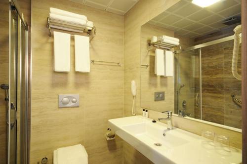 Kúpeľňa v ubytovaní Idas Hotel