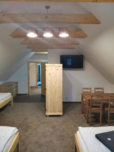 Postel nebo postele na pokoji v ubytování Chata Bramberk