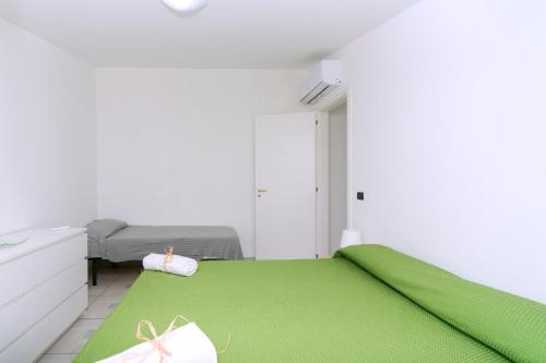 A bed or beds in a room at Brezza dell'Alento