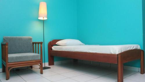 Llit o llits en una habitació de Zeelandia Suites
