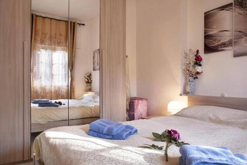 Una cama o camas en una habitación de AL CIOS lago Maggiore