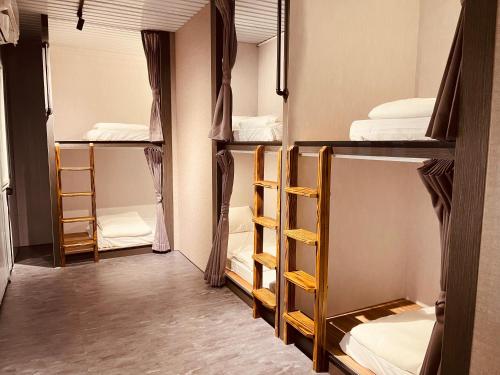 Postel nebo postele na pokoji v ubytování 東澳海安獨木舟背包客棧Hai An 2 Hostel
