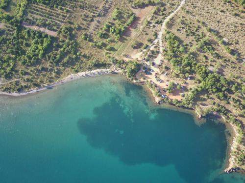 an aerial view of a group of islands and water at Seline Summer Home in Seline