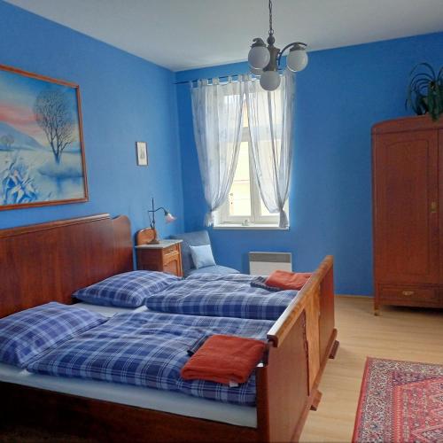 Postel nebo postele na pokoji v ubytování Villa Rosenberg