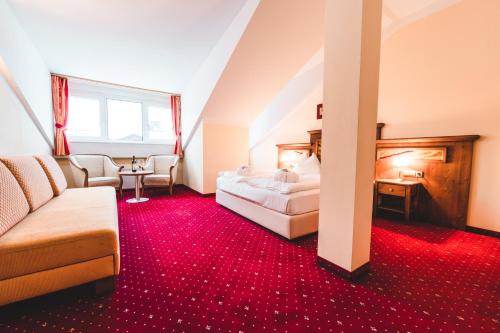 Ein Bett oder Betten in einem Zimmer der Unterkunft Appartements Cella Central