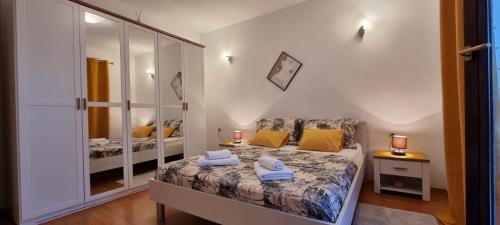 Postel nebo postele na pokoji v ubytování Apartman Luka Zadar
