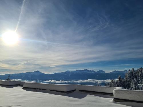 a view from the top of a snow covered mountain at Apartment Wanderlust Gerlitzen in Kanzelhöhe