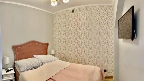 Postelja oz. postelje v sobi nastanitve Apartament Krokus ApartamentyZakopianskie Basen Sauna Jacuzzi