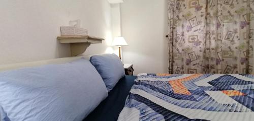 Letto o letti in una camera di Los Geranios n.25