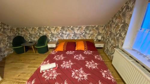 Una cama o camas en una habitación de Willa Justynka