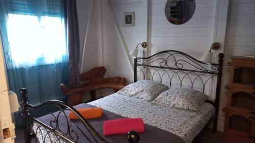 Ein Bett oder Betten in einem Zimmer der Unterkunft Cap Martinique