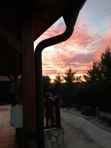 a view of a sunset from the porch of a house at Casa Telma y Hugo in Alcañiz