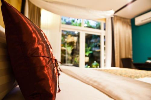 Katil atau katil-katil dalam bilik di Baan PhuAnda Phuket