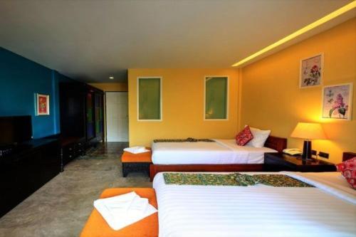 Katil atau katil-katil dalam bilik di Baan PhuAnda Phuket