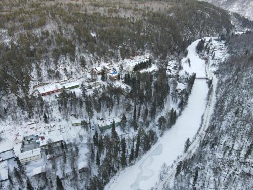 an aerial view of a resort in the snow at Pansionat Energetik in Nilovka