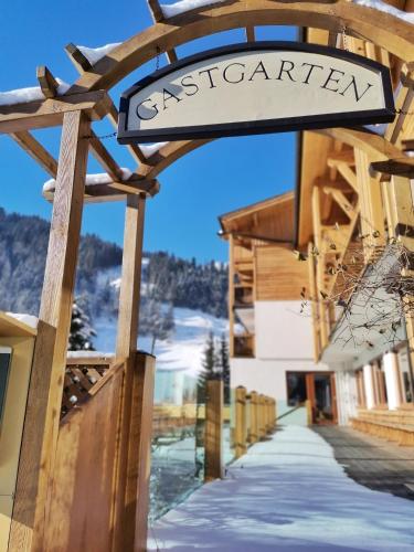 a sign for the entrance to a ski resort at Hotel Alpina in Rauris