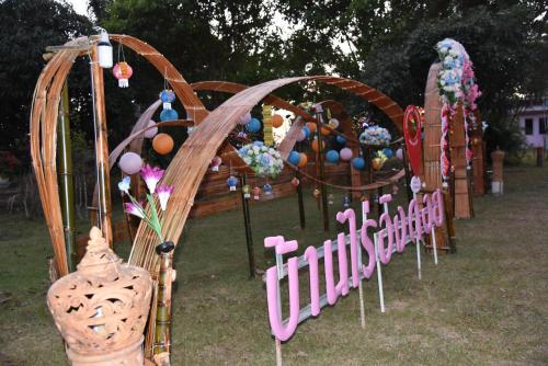 a park with a playground with a christmas decoration at ฺBaan Rai Ing Doi in Chaiyaphum