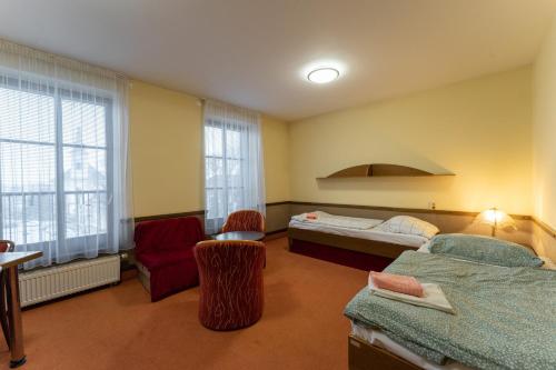 Postel nebo postele na pokoji v ubytování Hotel Amco