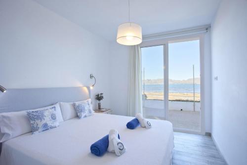 A bed or beds in a room at Ran de mar