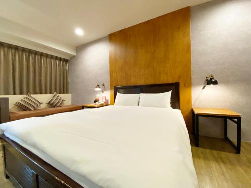 Taichung Old F Hotelにあるベッド