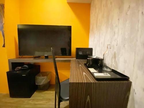 Kuchyň nebo kuchyňský kout v ubytování Taichung Old F Hotel