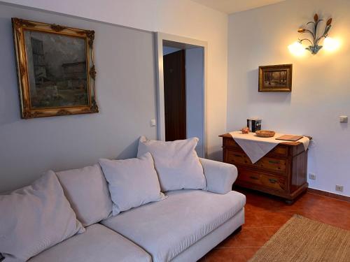 a living room with a couch and a table at Ferienwohnungen Reiteralpe in Ramsau