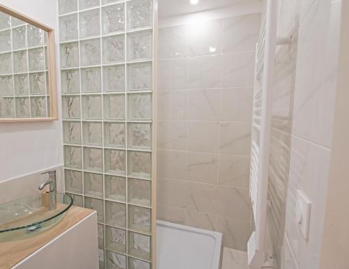 Ванная комната в Appartement Cosy , Vue imprenable, Parking Privé