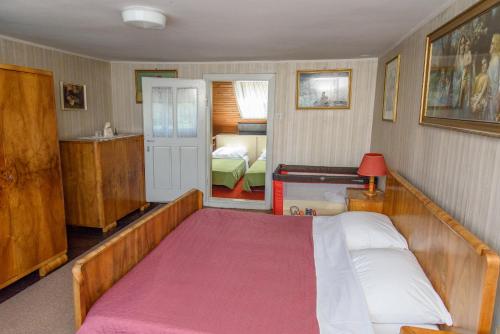 a bedroom with a large bed in a room at Apartment Mia in Donja Pačetina