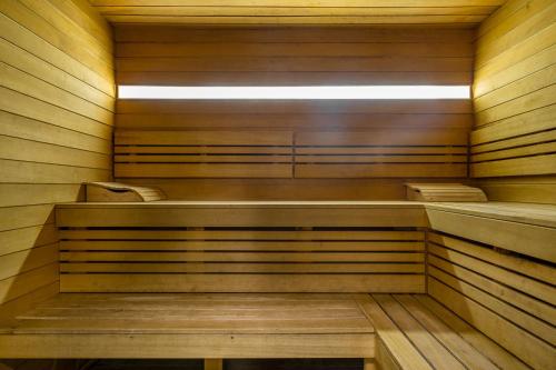 a wooden sauna with a light in the middle at Чевермето-Ірен in Luts'k