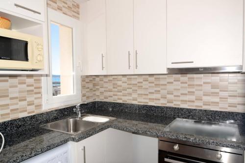 Η κουζίνα ή μικρή κουζίνα στο Apartament ARTS 2