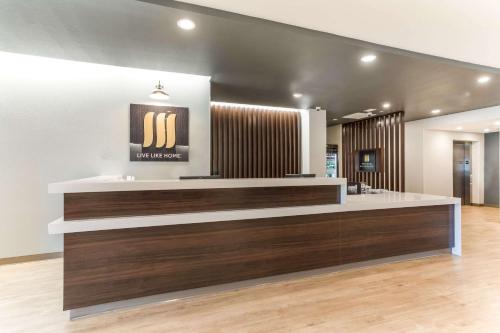 a lobby of a nail salon with a reception desk at MainStay Suites Murfreesboro in Murfreesboro