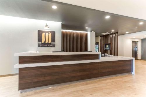 a lobby of a nail salon with a reception desk at MainStay Suites Murfreesboro in Murfreesboro