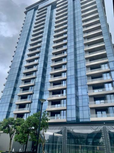 a tall building with a lot of windows at Umhlanga Arch 703 Sea View self-catering in Durban