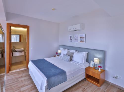 Кровать или кровати в номере Olea Nova Hotel