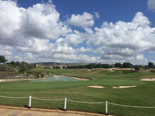 a view of the green at a golf course at Aphrodite Hills in Kouklia