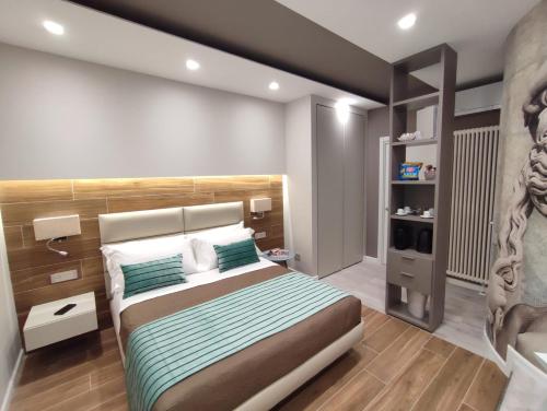 Postel nebo postele na pokoji v ubytování il sogno di afrodite luxury b and b