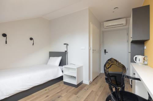 Posteľ alebo postele v izbe v ubytovaní ĄĘ Hostel Nowy Świat