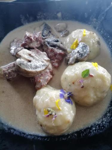 a bunch of food on a plate in a pan at L'ânon d'Andon in Andon