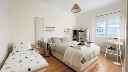 Posteľ alebo postele v izbe v ubytovaní Majesticlara Lisbon Guest House