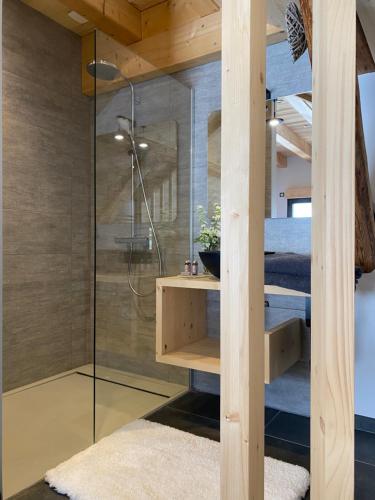 Ένα μπάνιο στο Escapade romantique avec spa privé en pleine nature