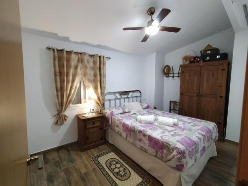 Ένα ή περισσότερα κρεβάτια σε δωμάτιο στο Casa de la Abuela