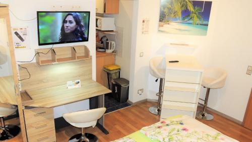 Televisyen dan/atau pusat hiburan di Appartements 4U Rodenbach