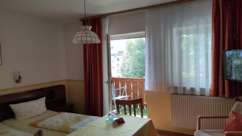 Ένα ή περισσότερα κρεβάτια σε δωμάτιο στο Pension Schneider, Bad Gögging