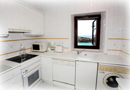 Kuchyň nebo kuchyňský kout v ubytování Apartamentos Turísticos Las Nieves Playa