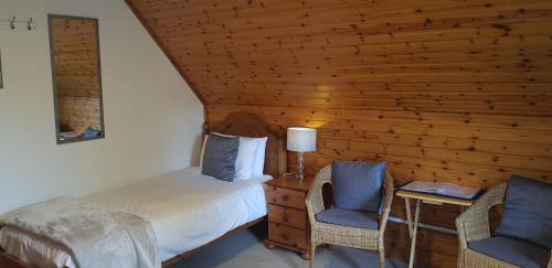 Ένα ή περισσότερα κρεβάτια σε δωμάτιο στο Carn Mhor Bed and Breakfast