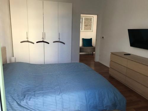 Ένα ή περισσότερα κρεβάτια σε δωμάτιο στο Menton vue jardins Biovès spacieux 2 pièces 52m2 en hypercentre