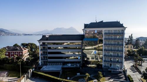 an aerial view of a building next to a lake at Residence Carl&Do in Baveno